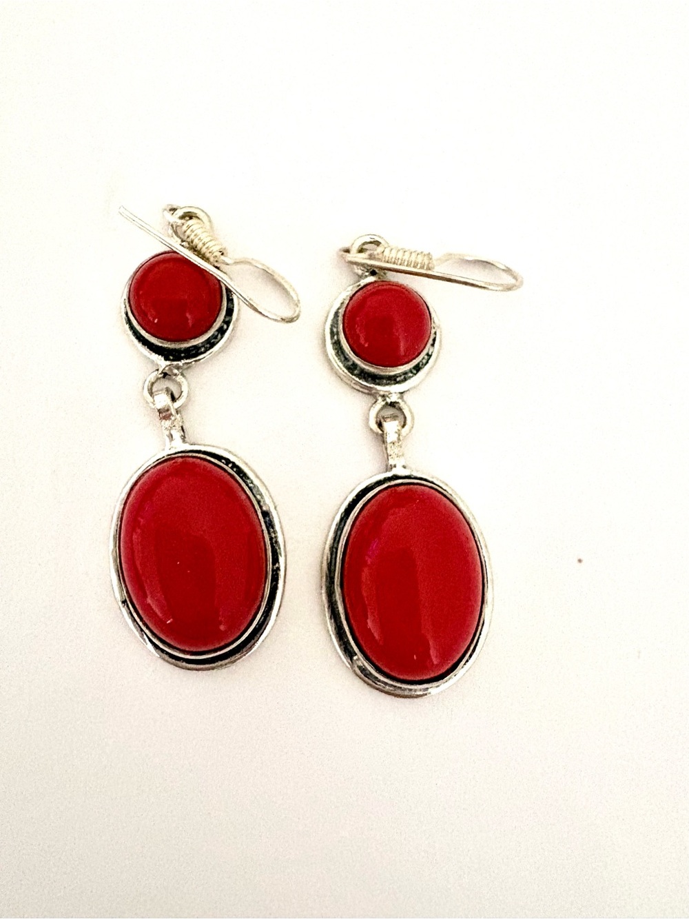 Beautiful 2 stone, 925 marked, dangling Coral earrings.